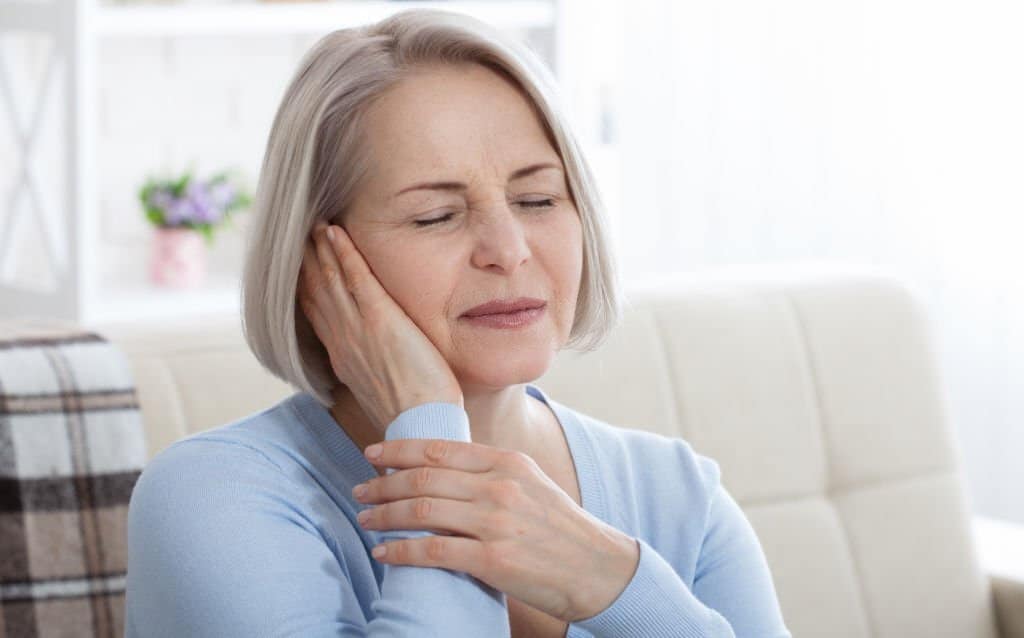 Lady Getting Tinnitus treatment